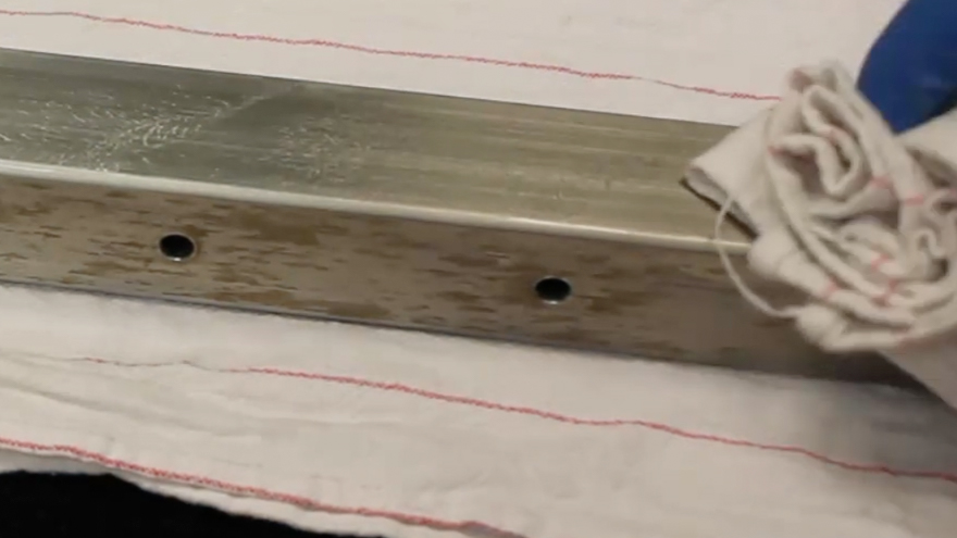 Rinse and dry stainless steel railing after passivation