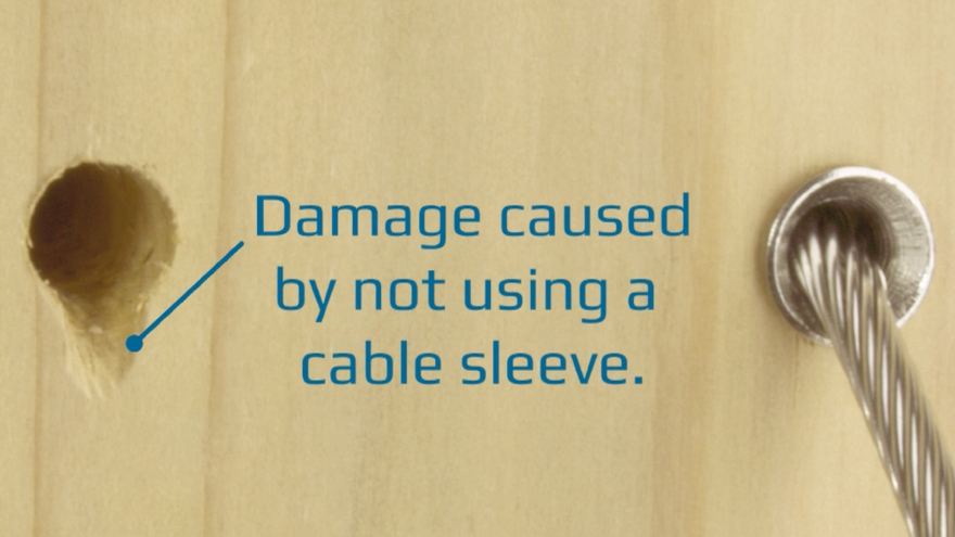 Slide stainless steel cable through cable sleeves in wood railing posts