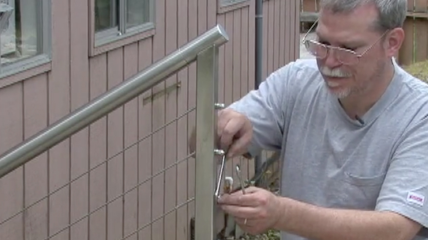 Clamp cable and tighten jam nuts during cable railing installation