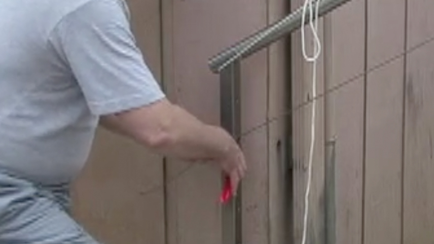 Cut stainless steel cable to length with cable cutters