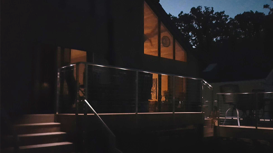 Deck railing handrail lighting. Microlights are installed in the deck handrail for decorative effect.