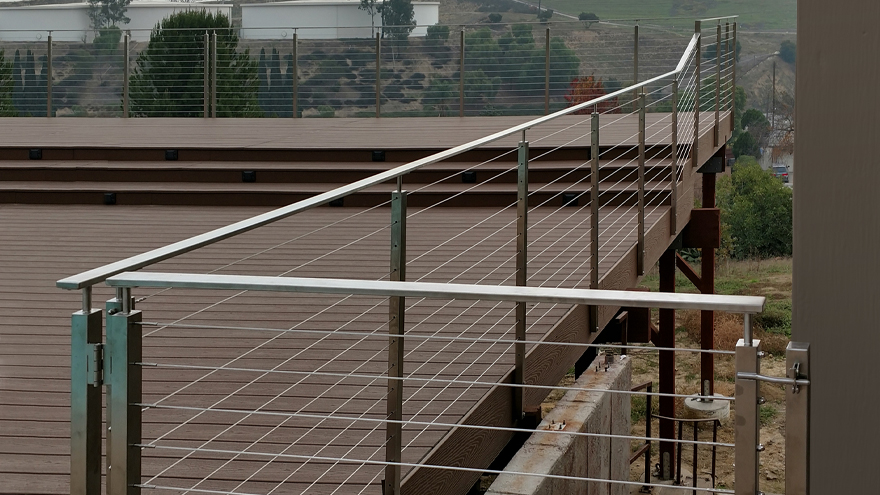 Custom railing gate with stainless posts