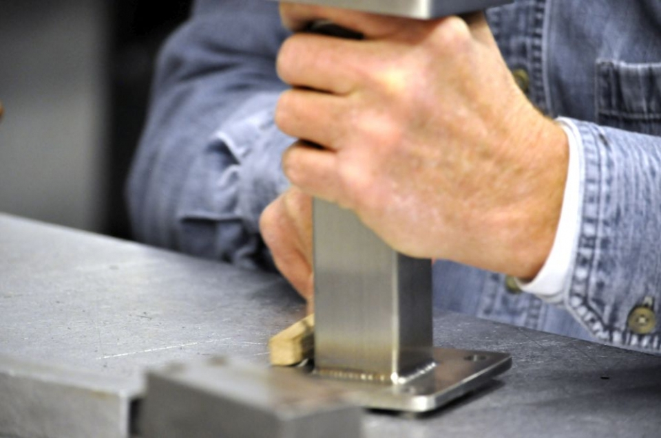 Custom TIG-welded railing part showing stainless steel craftsmanship
