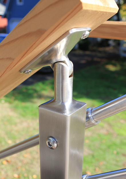 An AGS post stem reducer welded in place and polished, making the connection invisible
