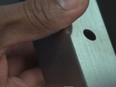 Close up of hand holding material